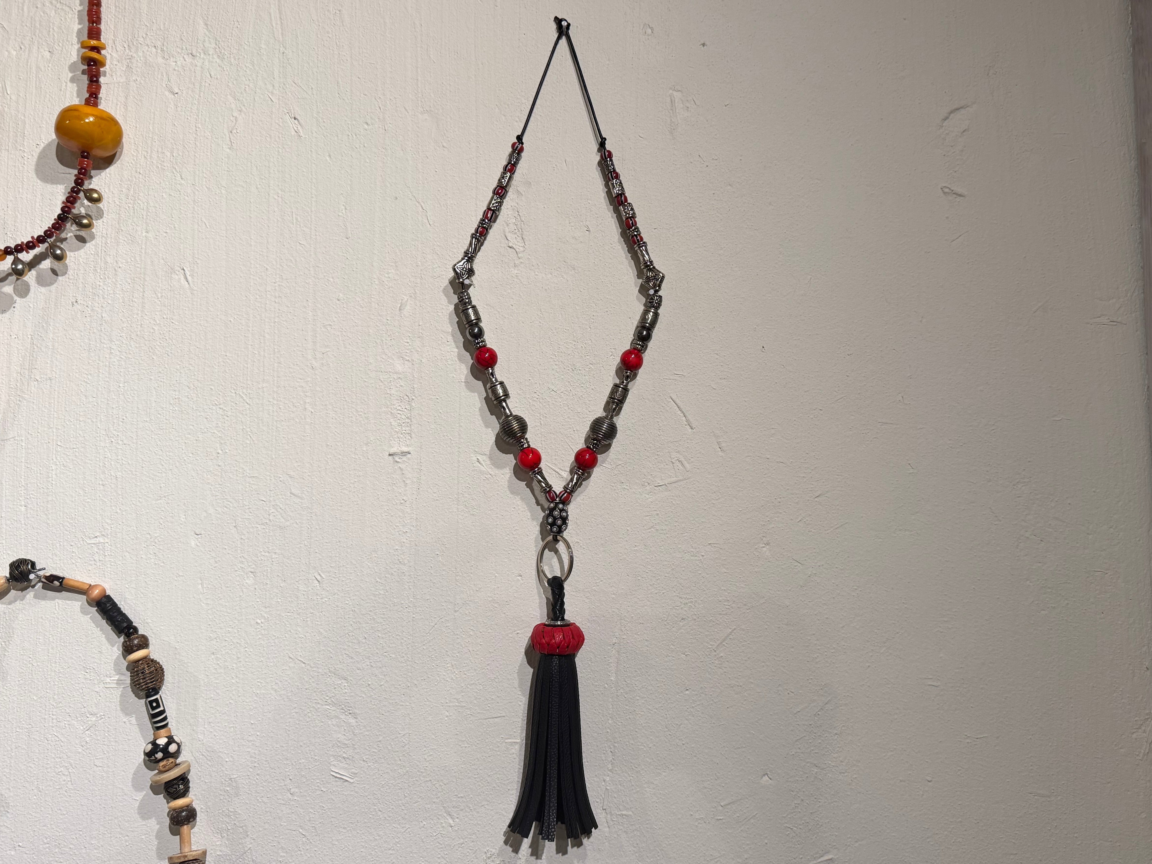 Steel and Ceramic Beads With Leather Tassel